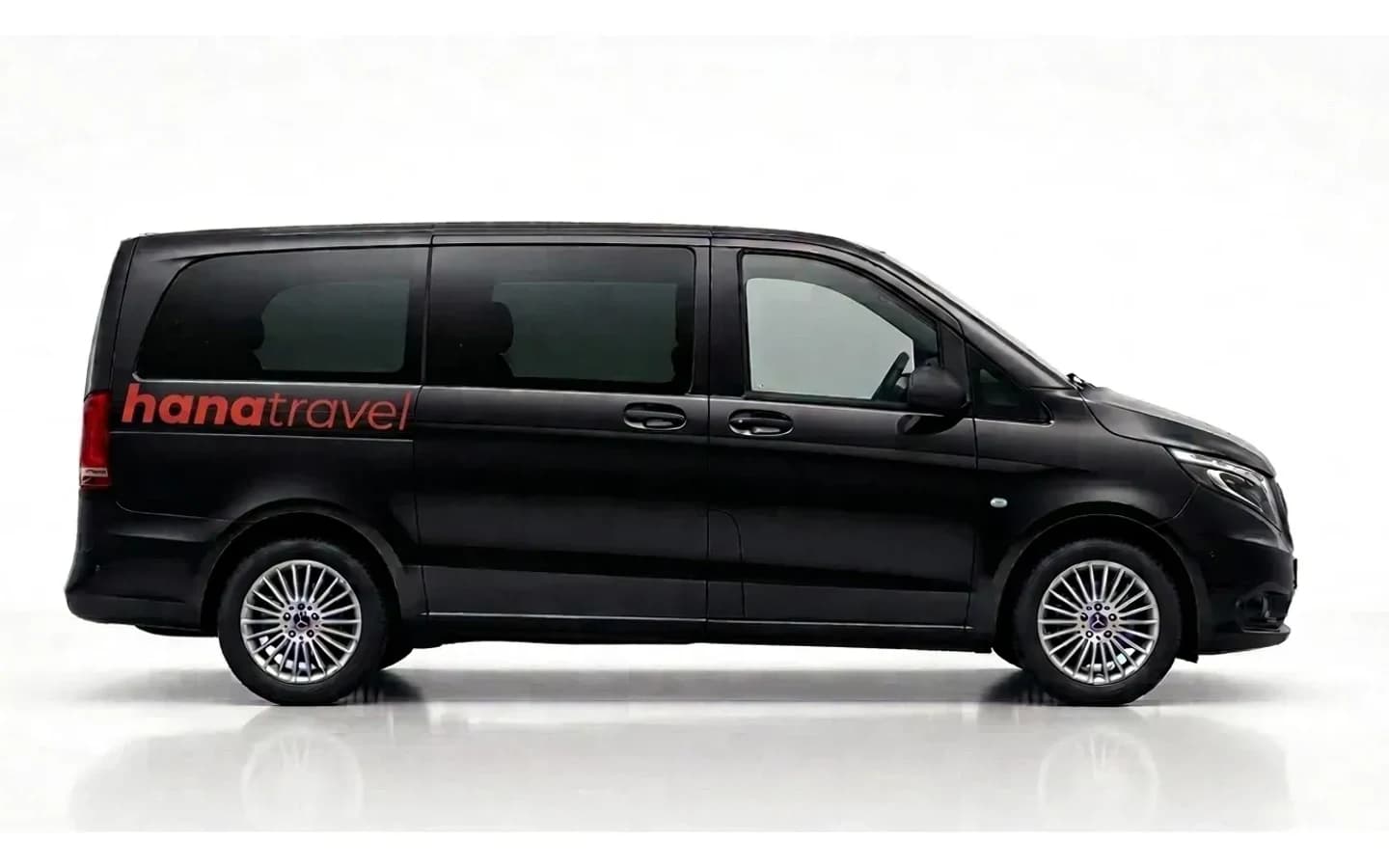 Mercedes-Benz Vito VIP airport transfer vehicle Side view of a black Mercedes-Benz Vito VIP on a white background, used for Antalya Airport transfers.
